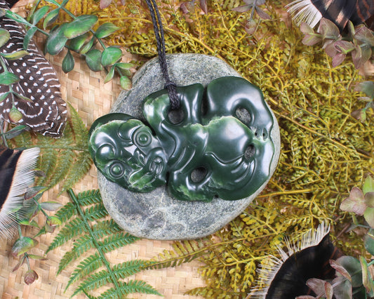 Hei Tiki carved from Flower Jade Pounamu - NZ Greenstone