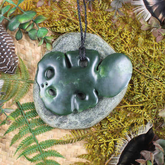 Hei Tiki carved from Flower Jade Pounamu - NZ Greenstone