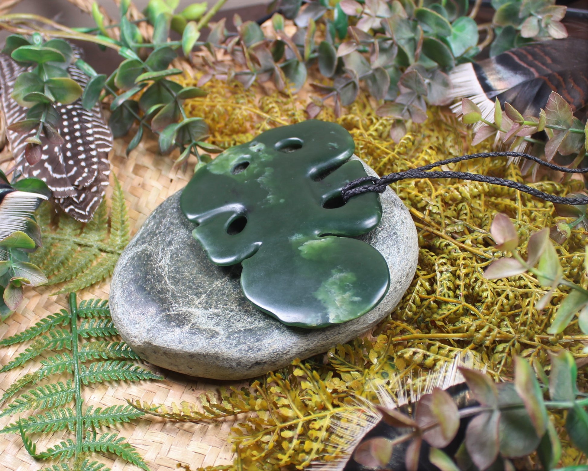 Hei Tiki carved from Flower Jade Pounamu - NZ Greenstone