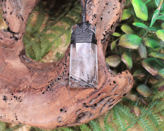 Clear Quartz with Black Tourmaline carved into a Toki or Adze