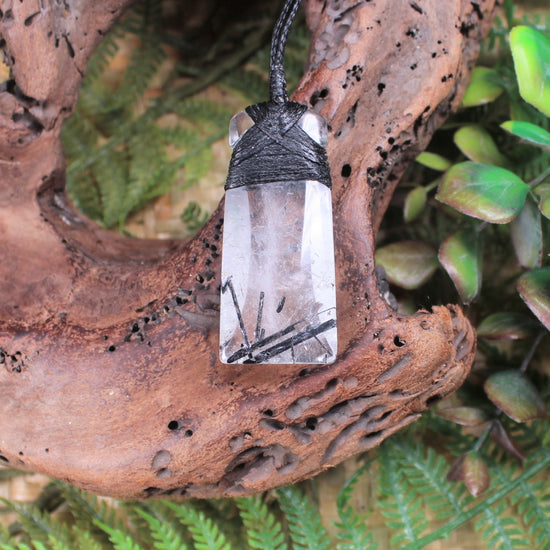 Clear Quartz with Black Tourmaline carved into a Toki or Adze
