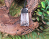 Clear Quartz with Black Tourmaline carved into a Toki or Adze