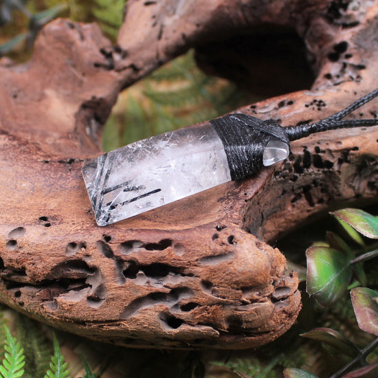 Clear Quartz with Black Tourmaline carved into a Toki or Adze