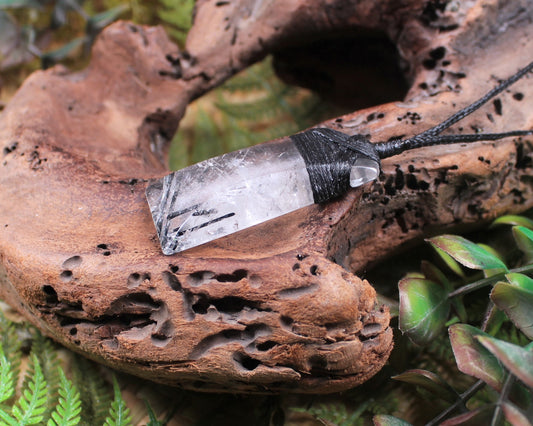 Clear Quartz with Black Tourmaline carved into a Toki or Adze