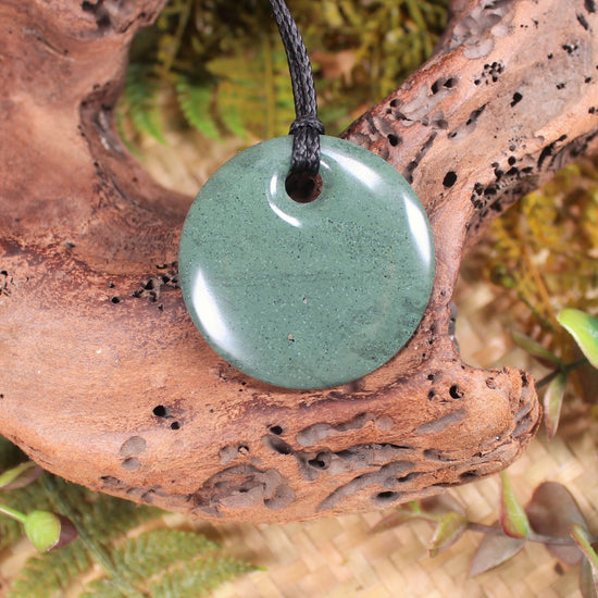 Porowhita or Pi Stone carved from NZ Pakohe or Argillite
