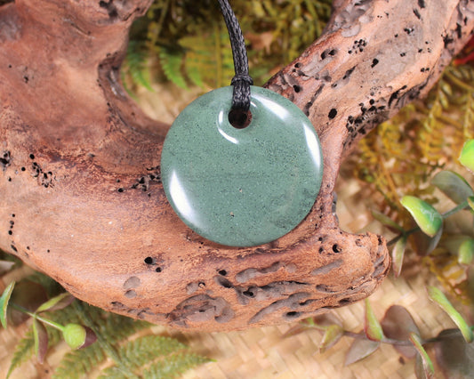 Porowhita or Pi Stone carved from NZ Pakohe or Argillite