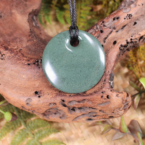 Porowhita or Pi Stone carved from NZ Pakohe or Argillite