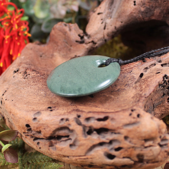 Porowhita or Pi Stone carved from NZ Pakohe or Argillite