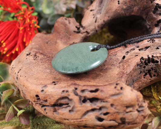 Porowhita or Pi Stone carved from NZ Pakohe or Argillite