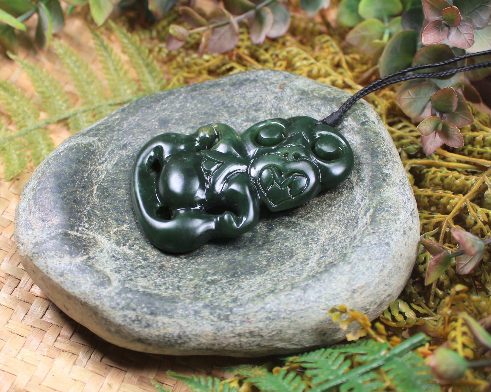 Hei Tiki Pendant carved from Flower Jade Pounamu
