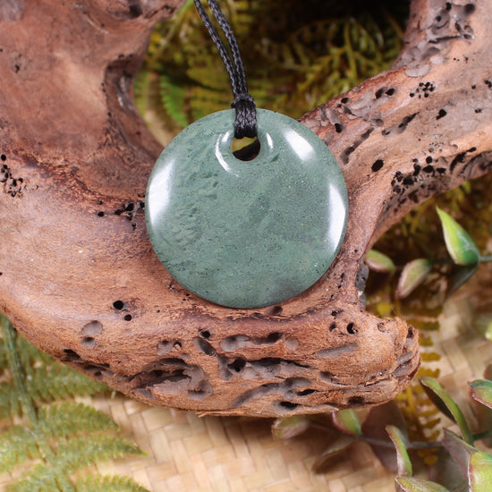 Porowhita or Pi Stone carved from NZ Pakohe or Argillite
