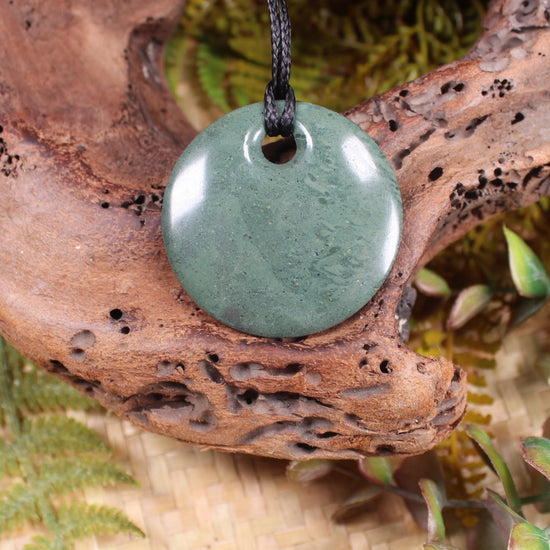 Porowhita or Pi Stone carved from NZ Pakohe or Argillite