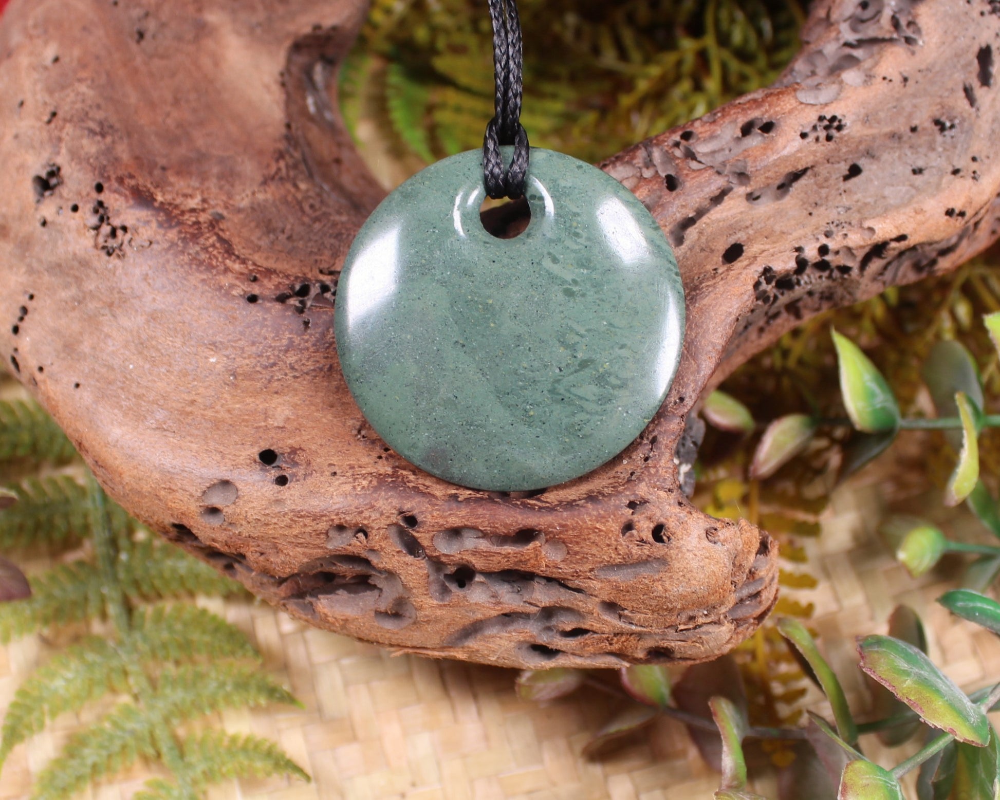 Porowhita or Pi Stone carved from NZ Pakohe or Argillite