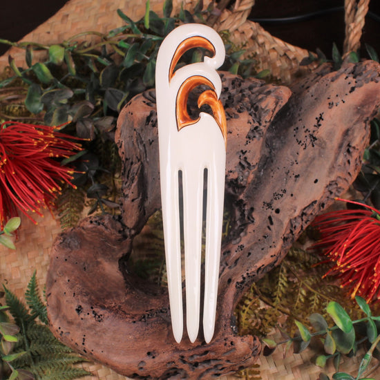 Heru with Koru carved from beef bone