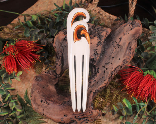 Heru with Koru carved from beef bone