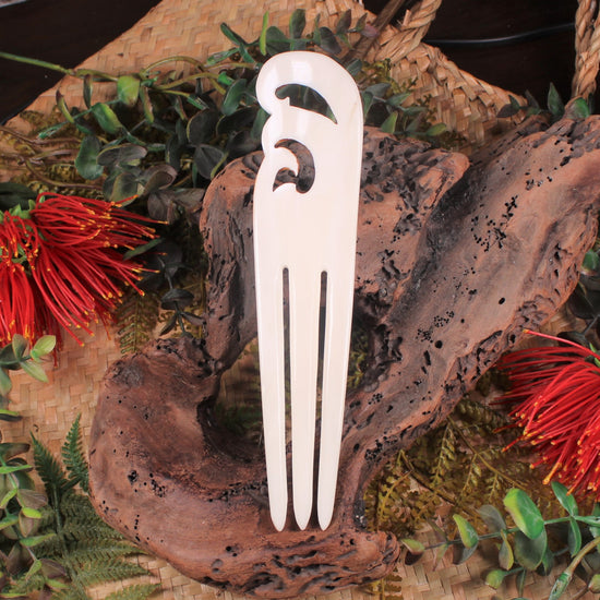 Heru with Koru carved from beef bone