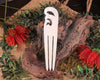 Heru with Koru carved from beef bone
