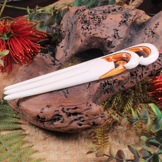 Heru with Koru carved from beef bone