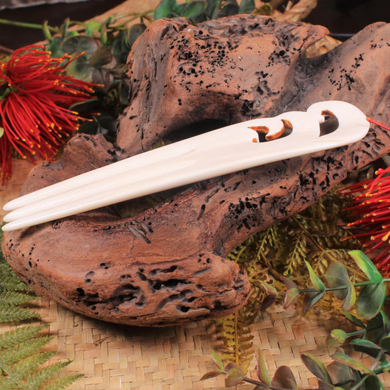 Heru with Koru carved from beef bone