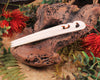 Heru with Koru carved from beef bone