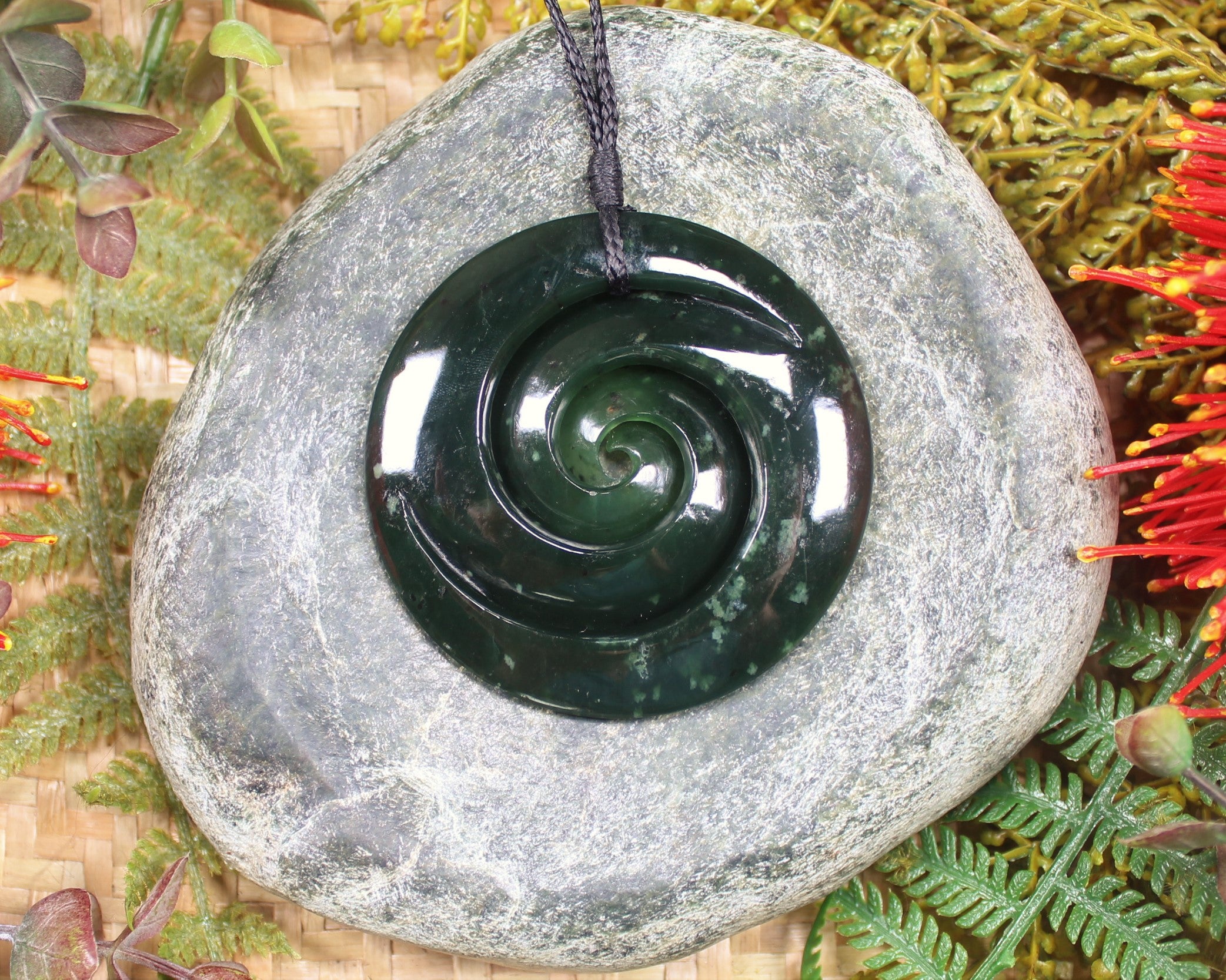 Koru or Spiral carved from Kawakawa Pounamu - NZ Greenstone