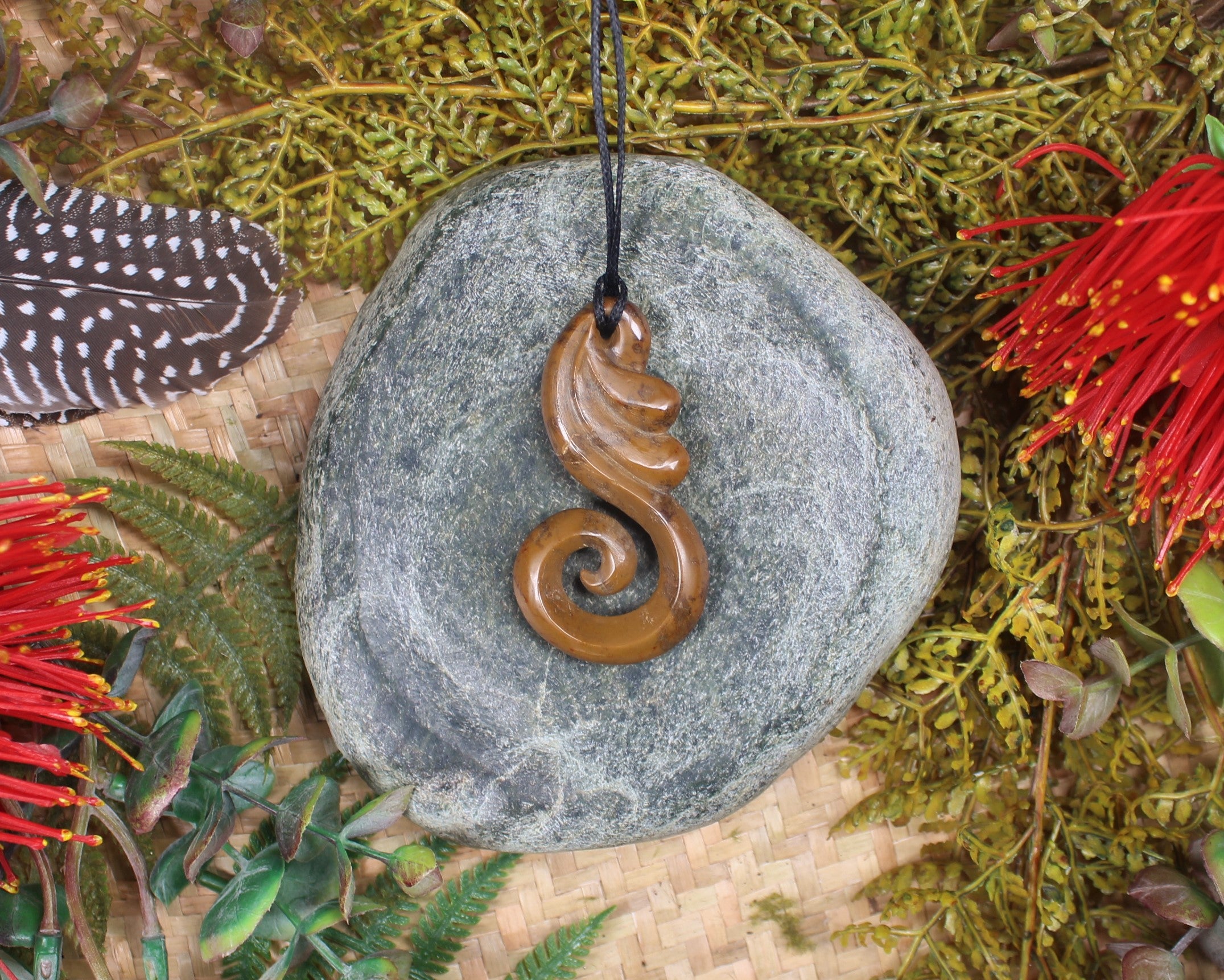 Koru or Spiral carved from NZ Fossilised Wood