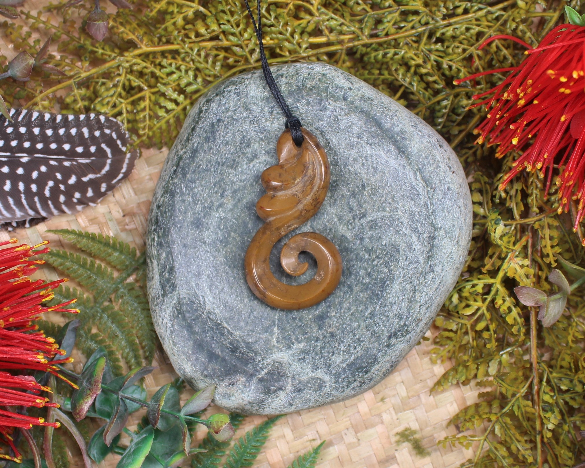 Koru or Spiral carved from NZ Fossilised Wood