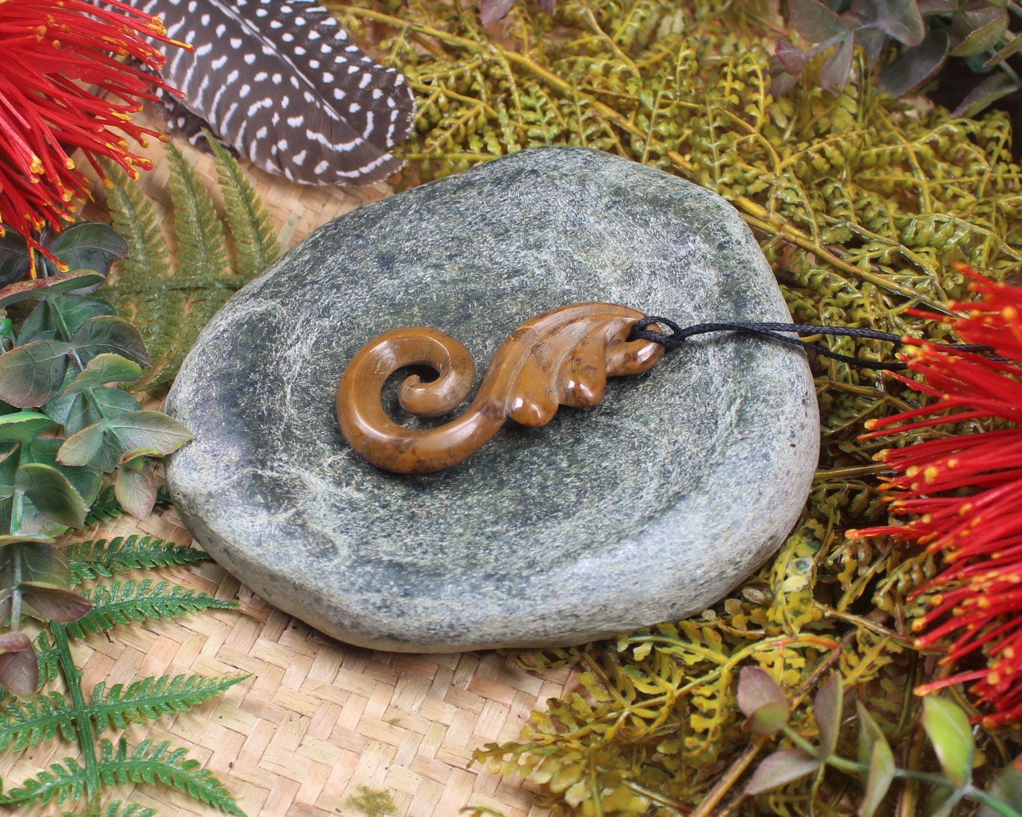 Koru or Spiral carved from NZ Fossilised Wood