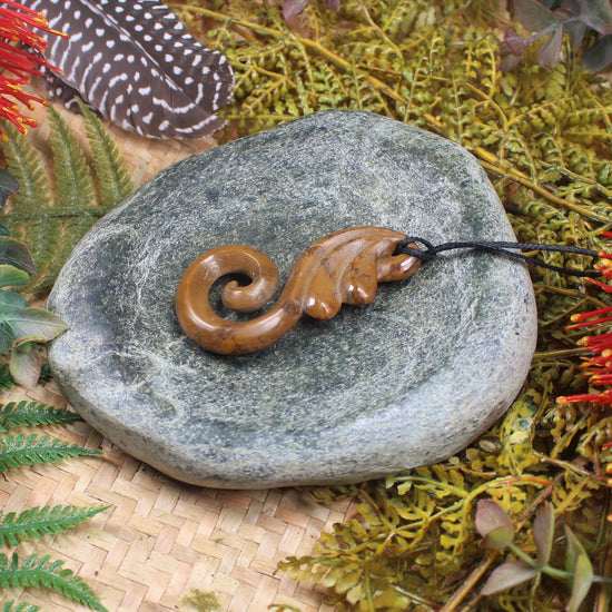 Koru or Spiral carved from NZ Fossilised Wood