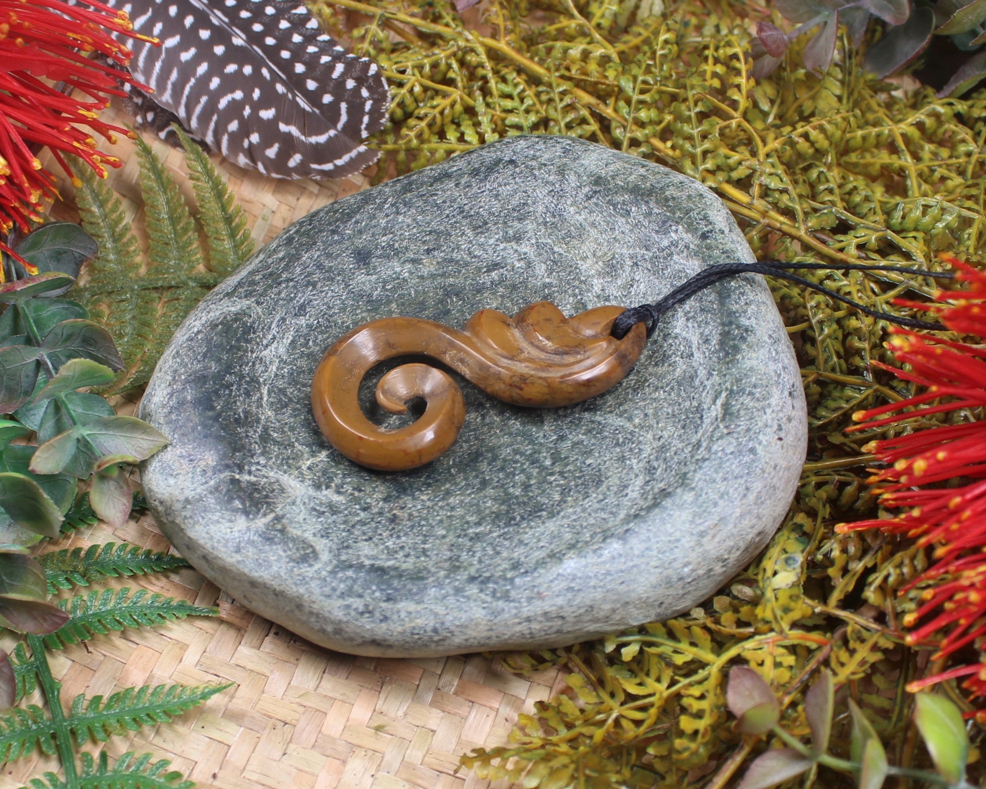 Koru or Spiral carved from NZ Fossilised Wood