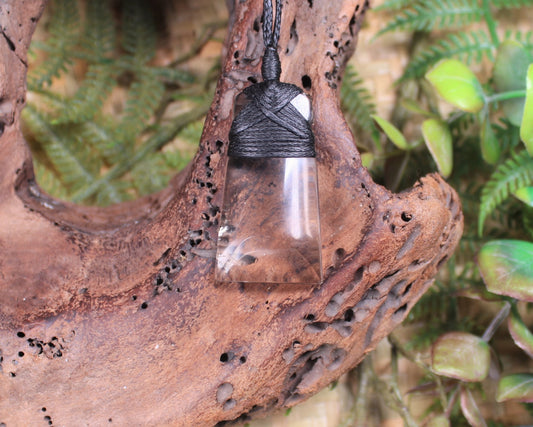 Toki pendant carved from Smokey Quartz