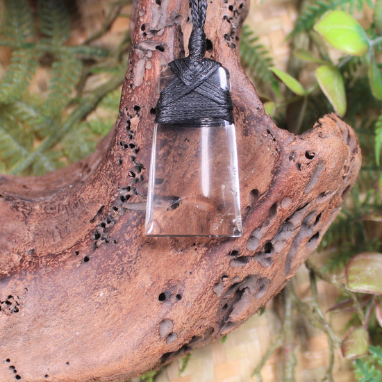 Toki pendant carved from Smokey Quartz