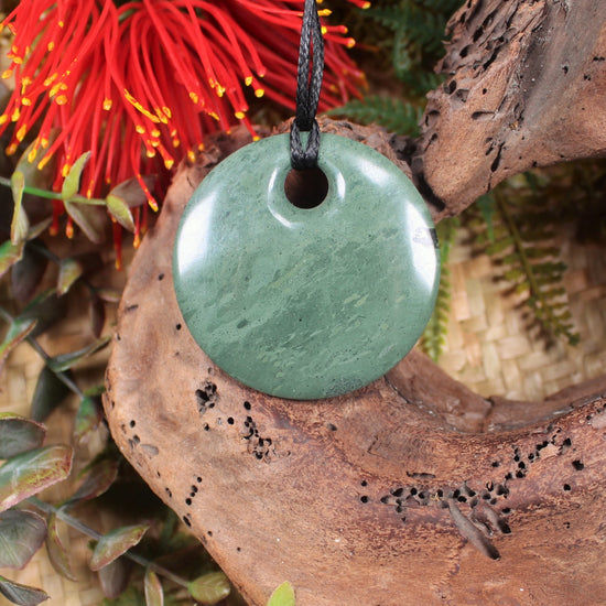 Porowhita or Pi Stone carved from NZ Pakohe or Argillite