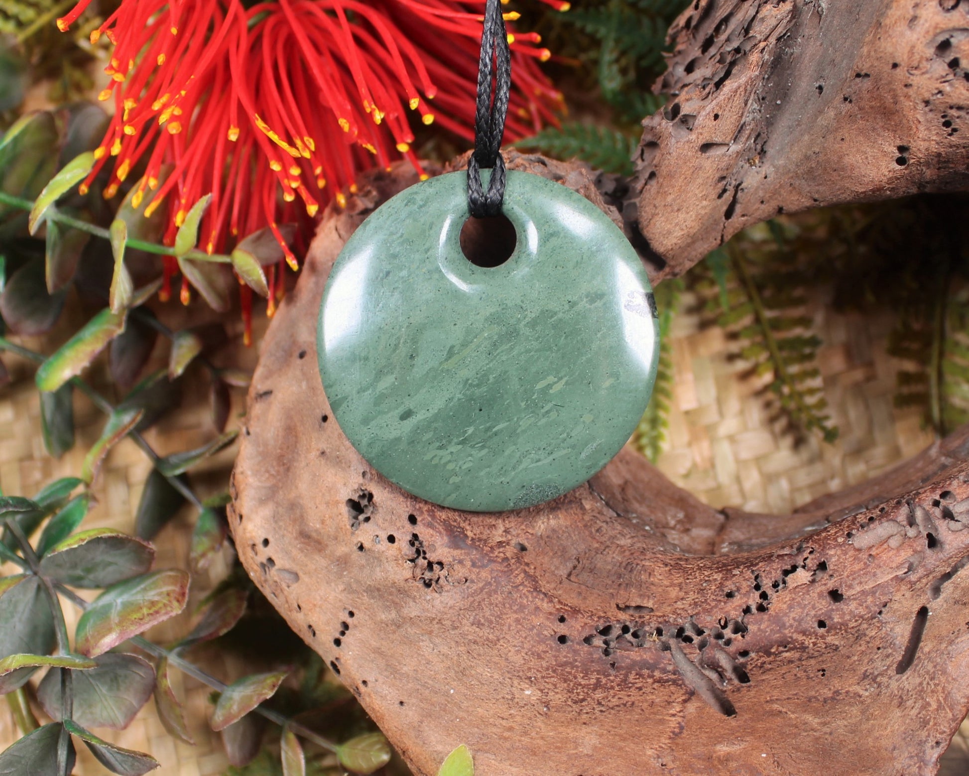 Porowhita or Pi Stone carved from NZ Pakohe or Argillite