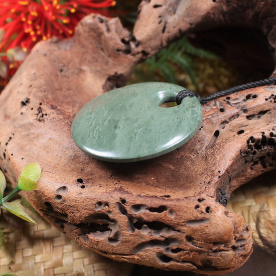 Porowhita or Pi Stone carved from NZ Pakohe or Argillite