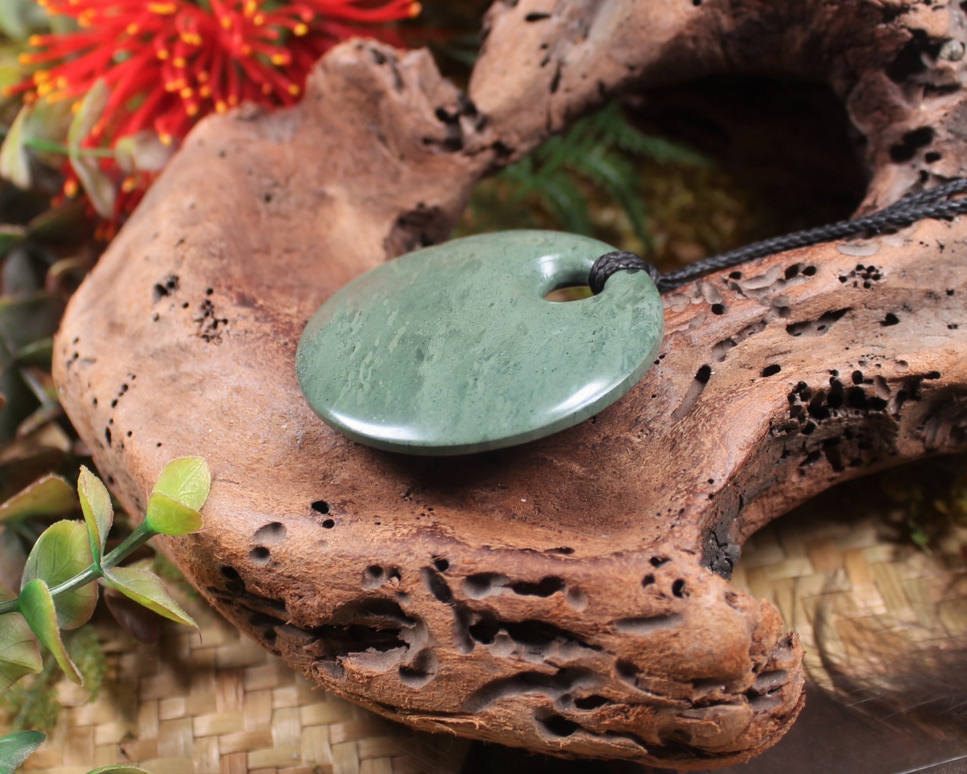 Porowhita or Pi Stone carved from NZ Pakohe or Argillite