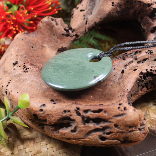 Porowhita or Pi Stone carved from NZ Pakohe or Argillite