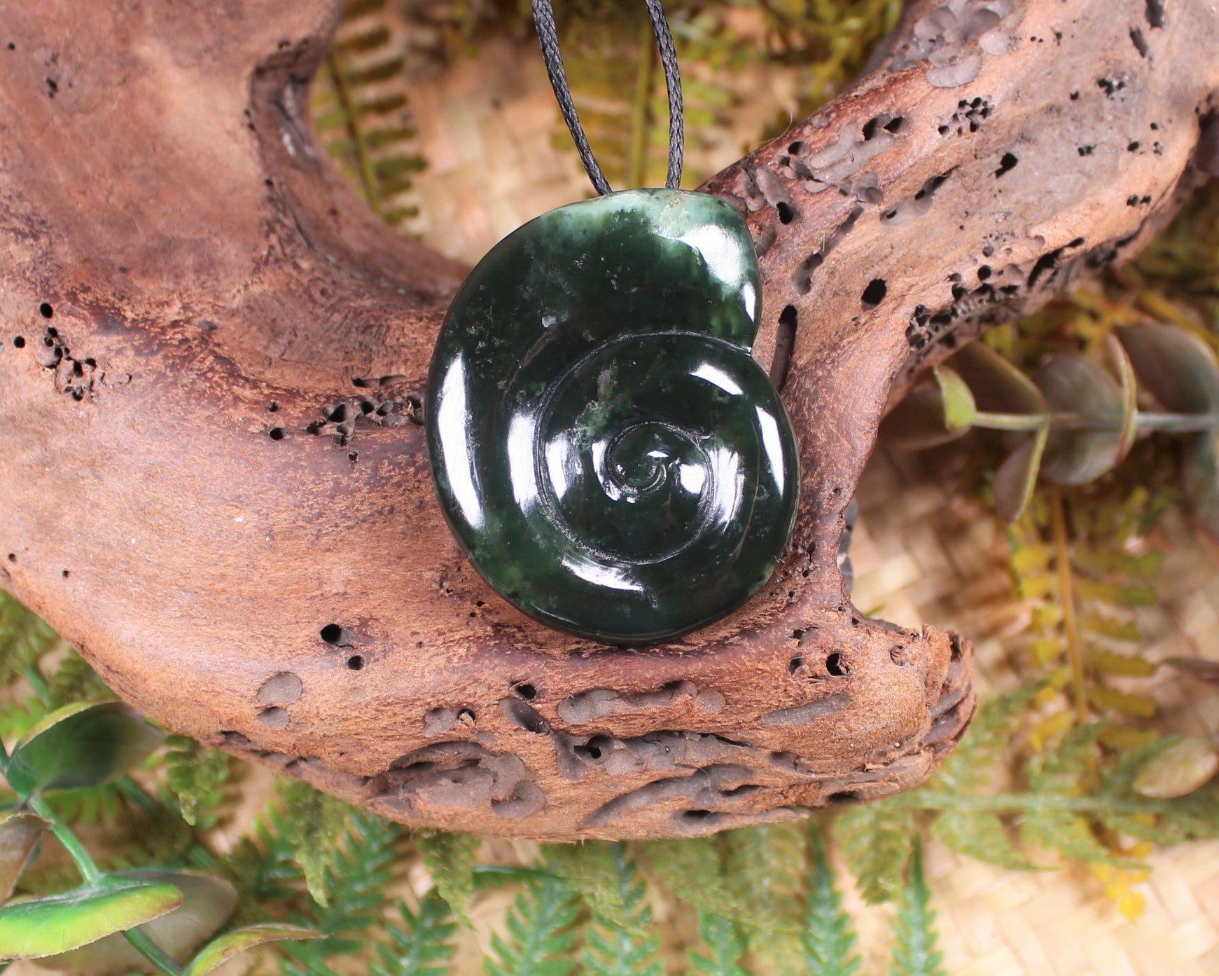 Koru pendant carved from Kawakawa Pounamu - NZ Greenstone