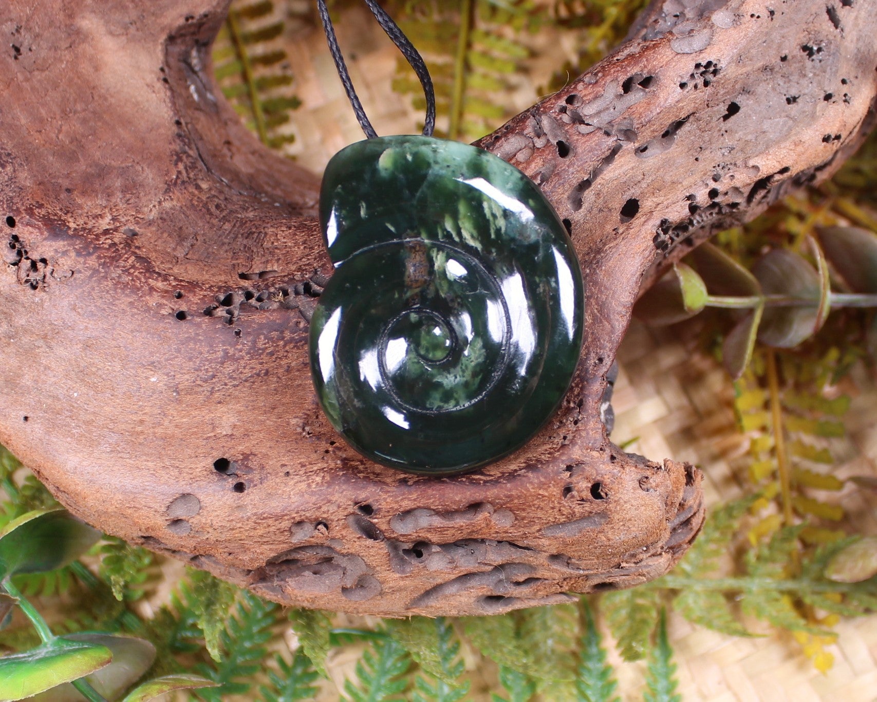 Koru pendant carved from Kawakawa Pounamu - NZ Greenstone