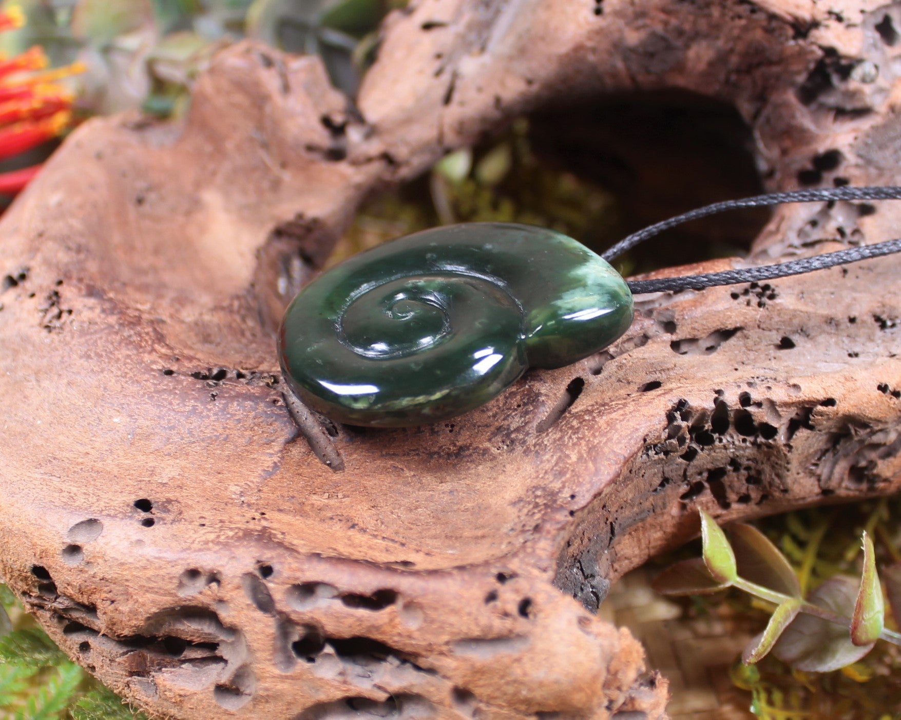 Koru pendant carved from Kawakawa Pounamu - NZ Greenstone