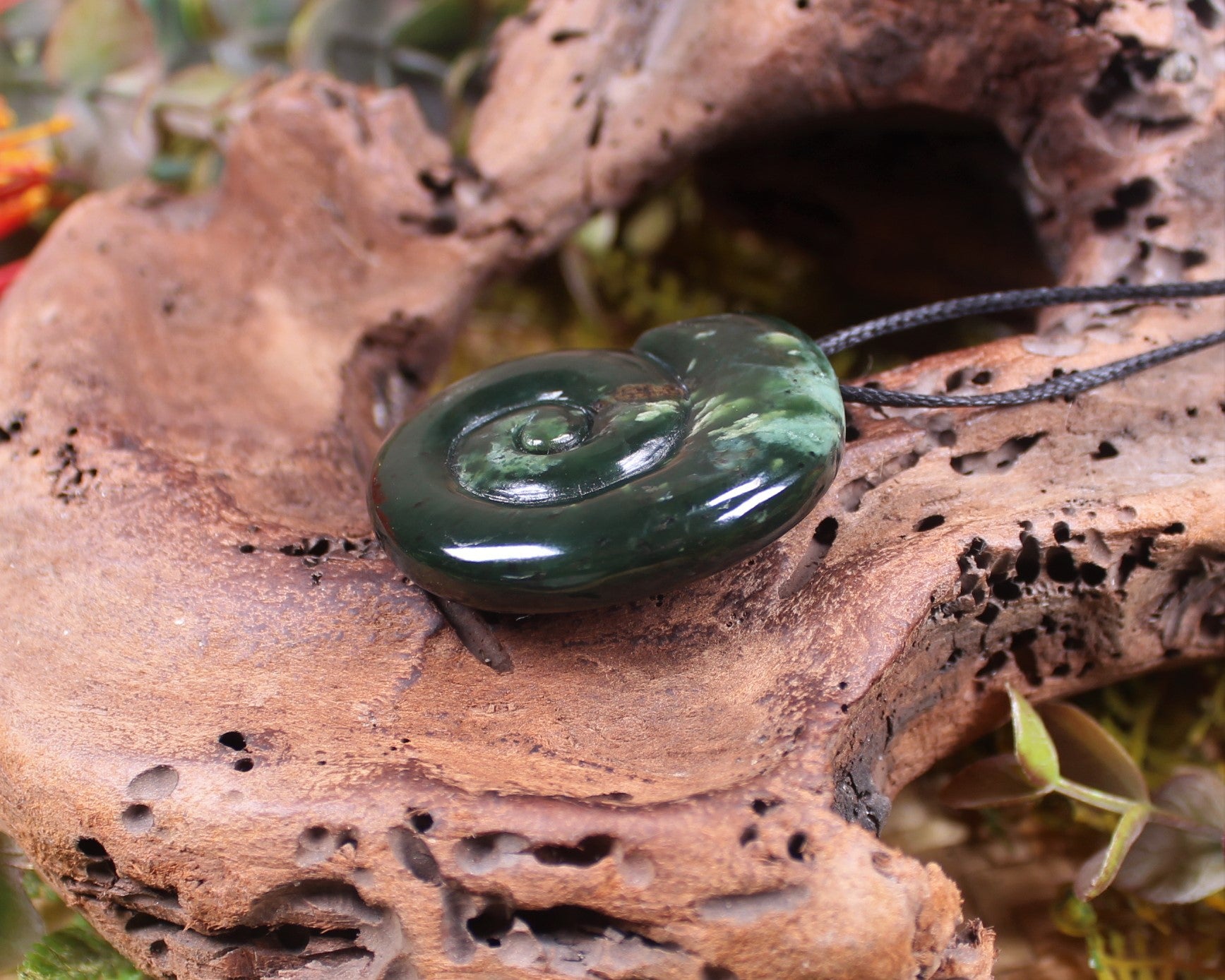 Koru pendant carved from Kawakawa Pounamu - NZ Greenstone