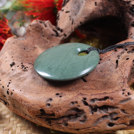 Porowhita or Pi Stone carved from NZ Pakohe or Argillite