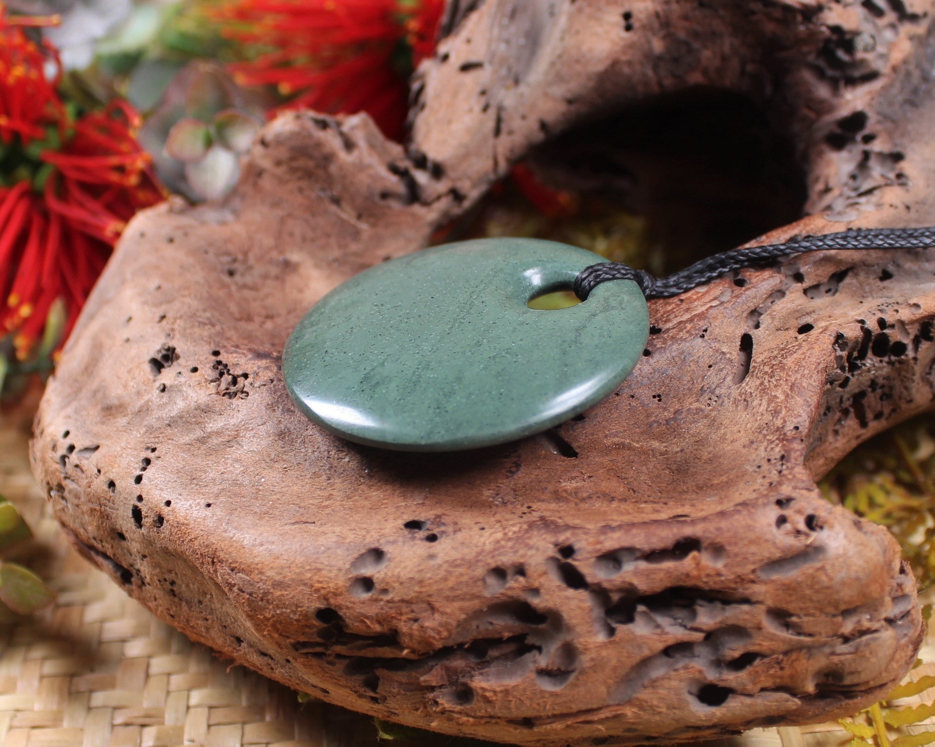 Porowhita or Pi Stone carved from NZ Pakohe or Argillite