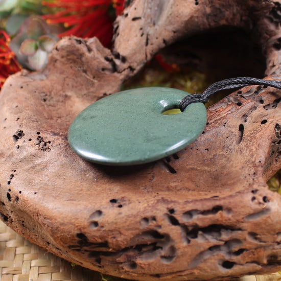 Porowhita or Pi Stone carved from NZ Pakohe or Argillite