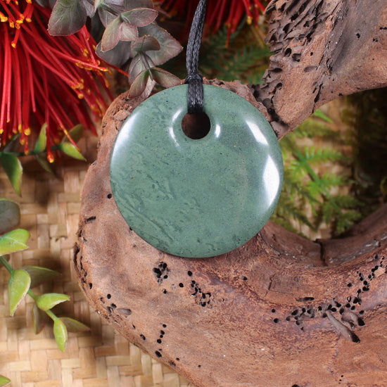 Porowhita or Pi Stone carved from NZ Pakohe or Argillite