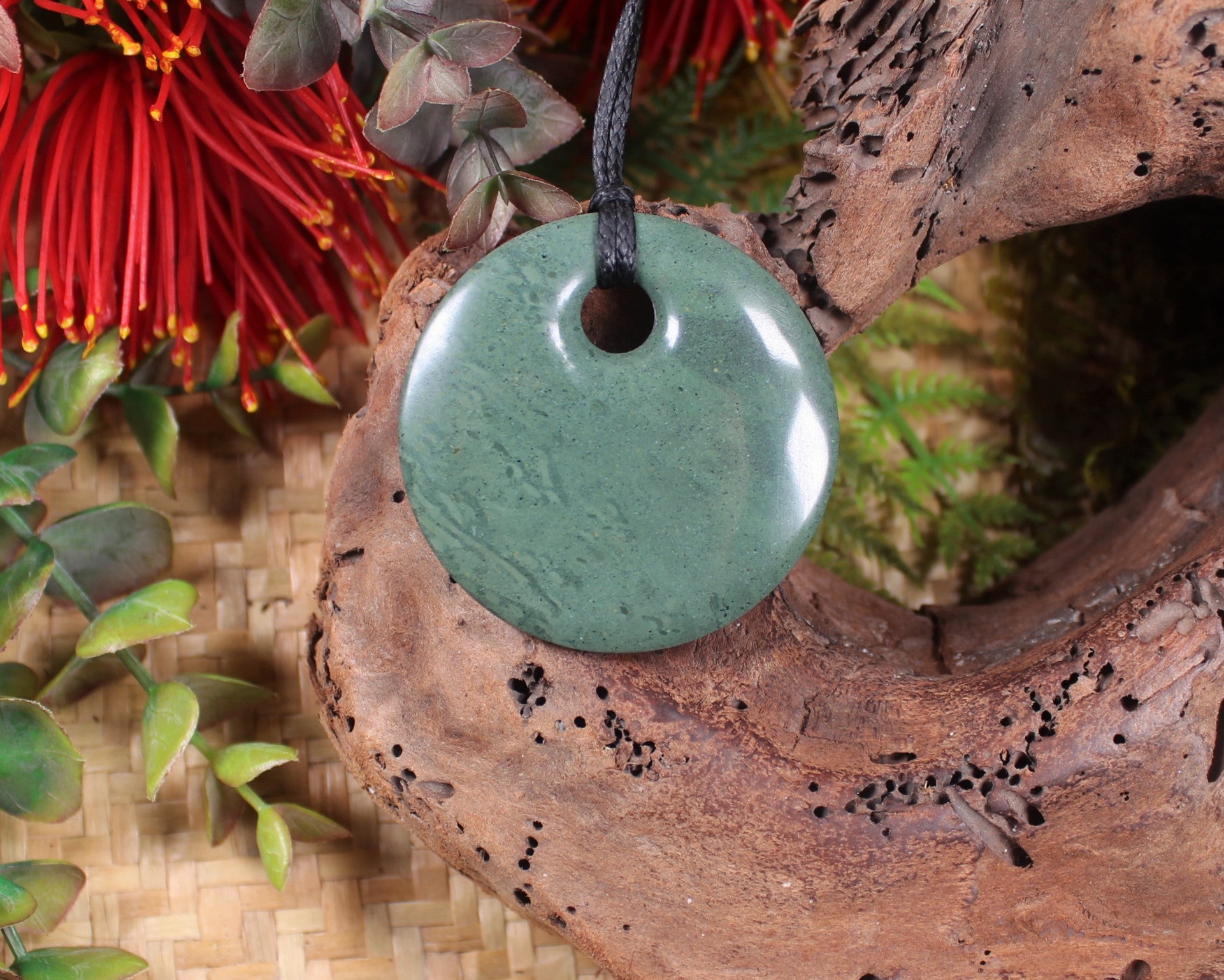 Porowhita or Pi Stone carved from NZ Pakohe or Argillite