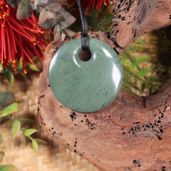 Porowhita or Pi Stone carved from NZ Pakohe or Argillite
