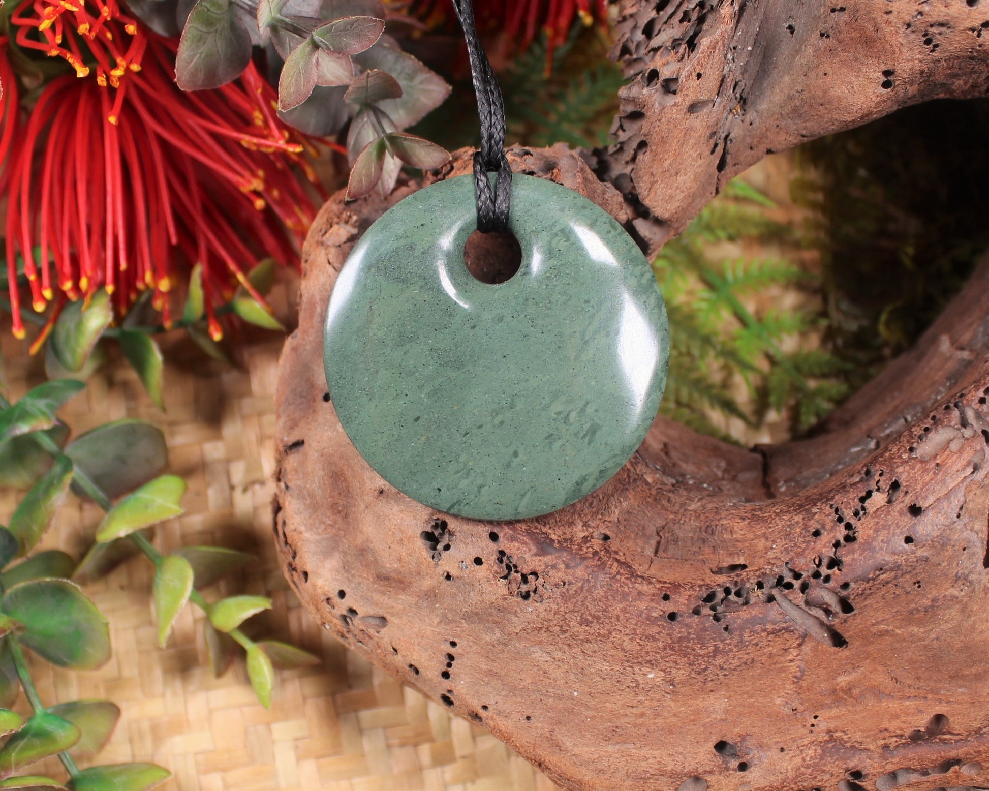 Porowhita or Pi Stone carved from NZ Pakohe or Argillite