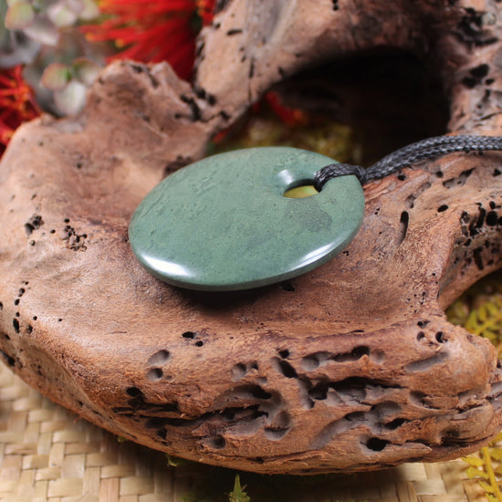 Porowhita or Pi Stone carved from NZ Pakohe or Argillite