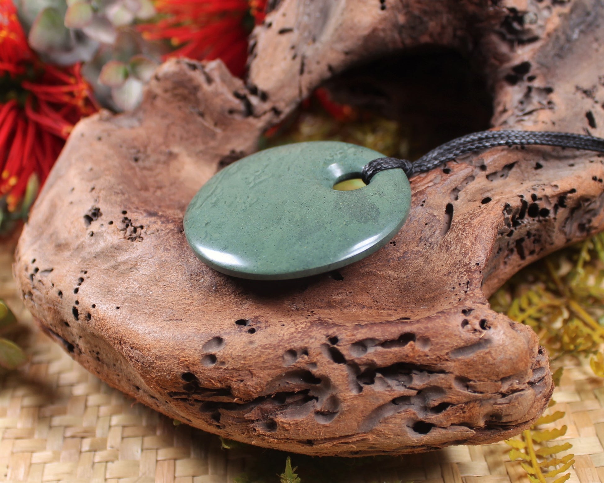 Porowhita or Pi Stone carved from NZ Pakohe or Argillite